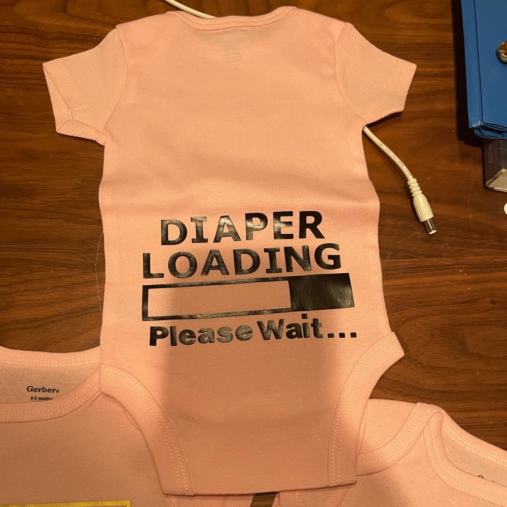 Baby onesies personalized with “Diaper loading…..please wait”